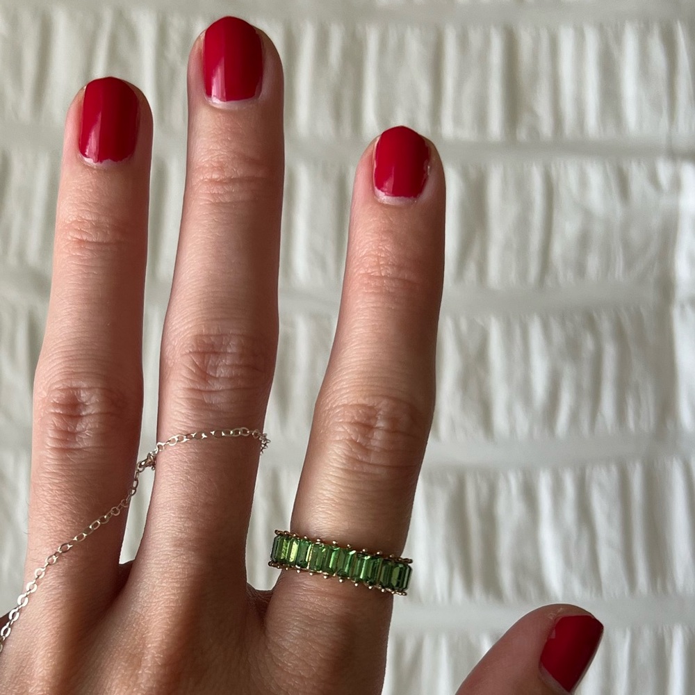 BaubleBar eternity band with green stones, size 6.